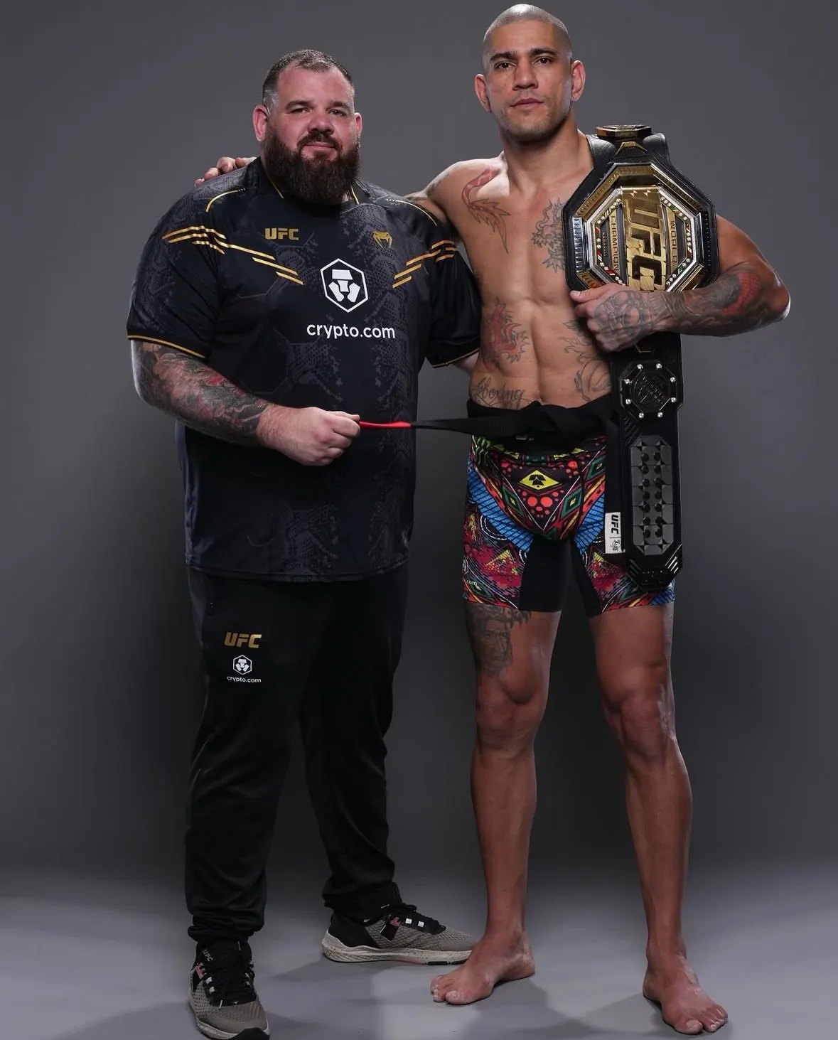 Coach Plinio Cruz beside UFC champion Alex Pereira